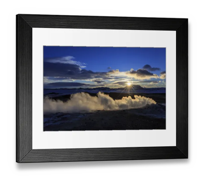 Framed Print : Hot springs and geothermal area in front of mountain landscape in winter