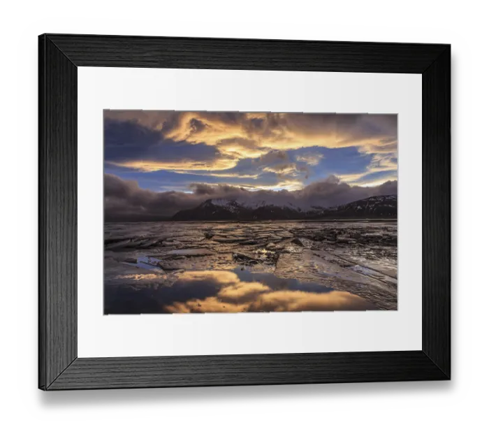 Framed Print : Cloudy mood and evening light over a fjord
