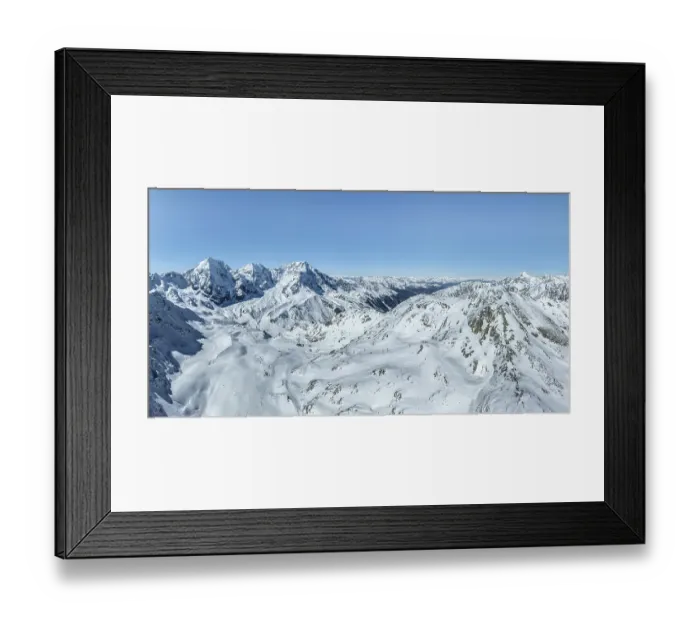 Framed Print : Aerial view, snow-covered mountain landscape Framed Print : Aerial view, snow-covered mountain landscape