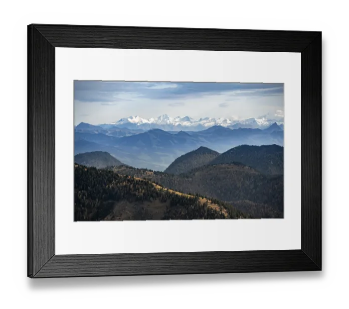 Framed Print : View of the Alpine foothills and main Alpine ridge with snow-covered peaks Framed Print : View of the Alpine foothills and main Alpine ridge with snow-covered peaks