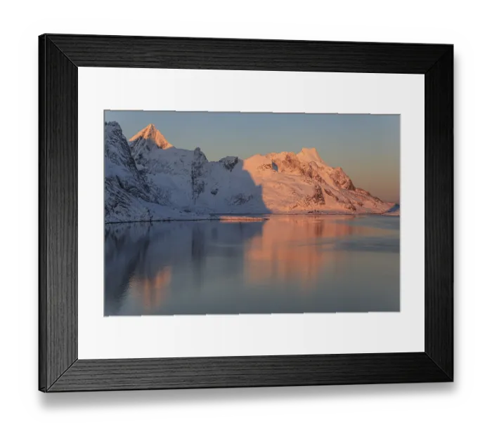Framed Print : Snow-covered mountains reflected in the fjord at sunrise Framed Print : Snow-covered mountains reflected in the fjord at sunrise
