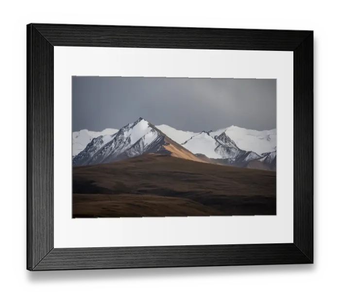 Framed Print : Glaciated and snow-capped mountains