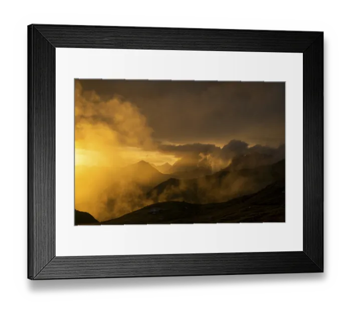 Framed Print : Montafon mountains with dramatic cloudy sky at sunset