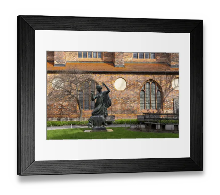 Framed Print : Klio statue in front of the side wing of the Nikolaikirche