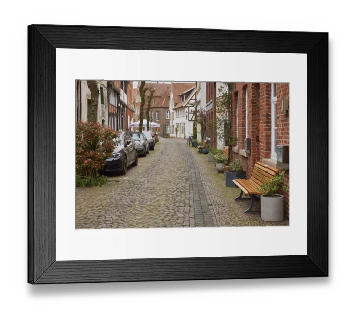 Framed Print : Small street with historic brick houses