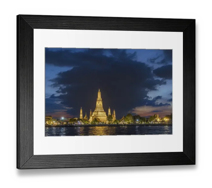 Framed Print : Wat Arun, Temple of Dawn at sunset with dark clouds