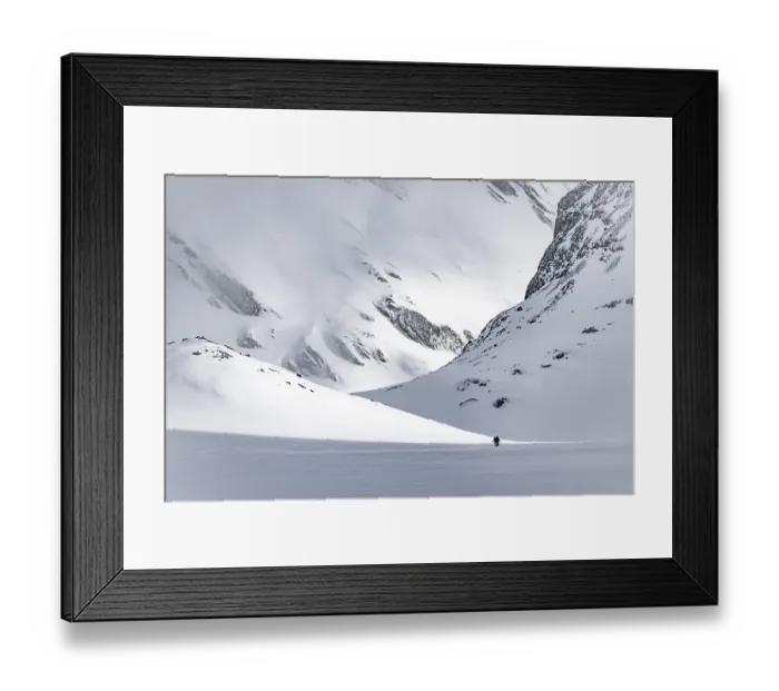 Framed Print : Dramatic atmosphere, Ski tourers in the vast landscape