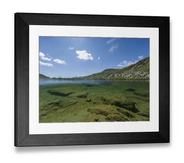 Framed Print : Clear mountain landscape with underwater view and sunny sky