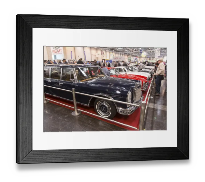 Framed Print : Visitors to Techno Classica take a look at a Mercedes Benz 600