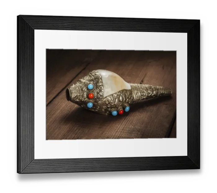 Framed Print : Tibetan Buddhist Conch Shell Horn Dung-Dkar on wooden background