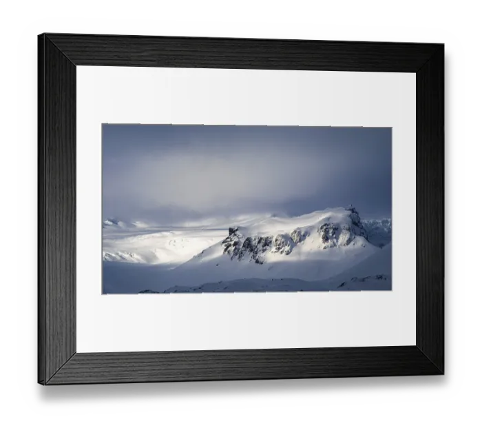 Framed Print : Fog, light and shadow on the snowy summit of Breidamerkurfjall