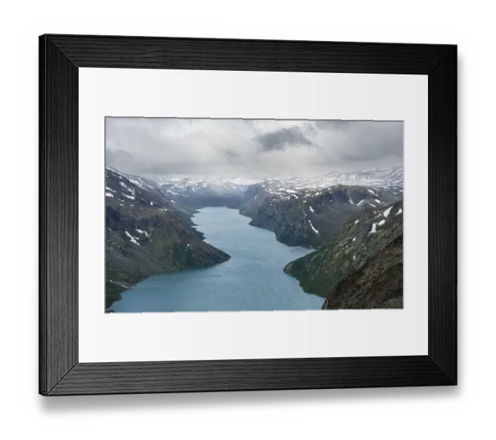 Framed Print : View of Lake Gjende and snowy mountains