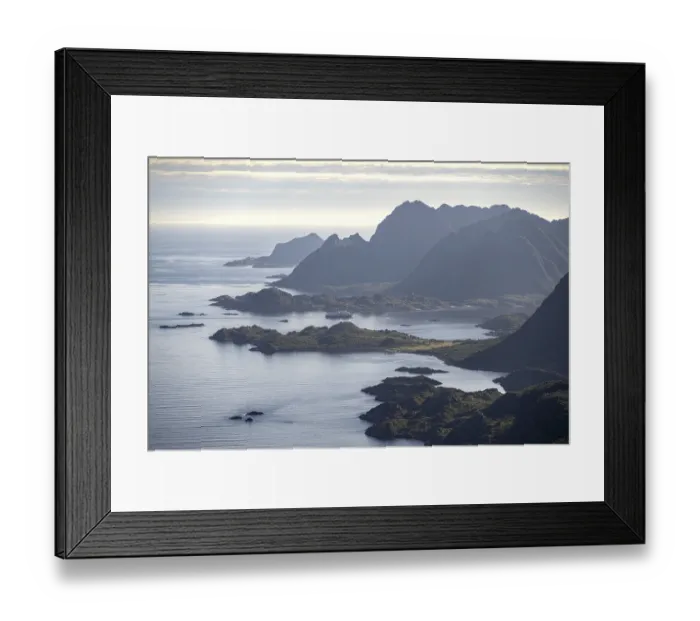 Framed Print : View of the coast in Ulvagsundet fjord and mountains in the evening light