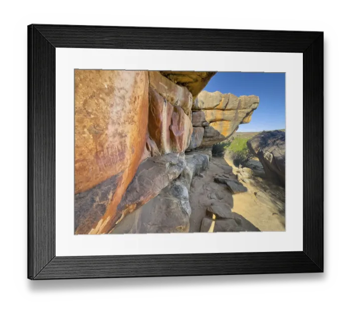 Framed Print : Prehistoric depiction of woman on a rock