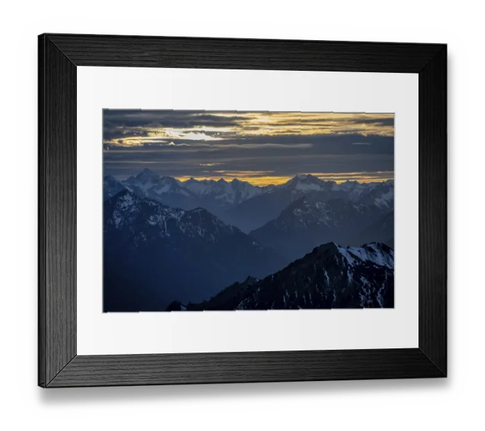 Framed Print : Mountain panorama with snow at sunset Framed Print : Mountain panorama with snow at sunset