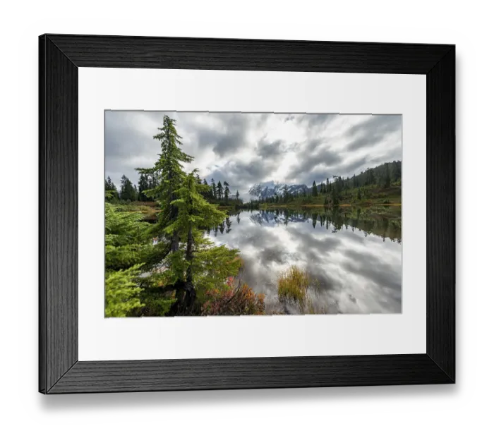 Framed Print : Mt. Shuksan in clouds, glacier with snow with reflection in Picture Lake