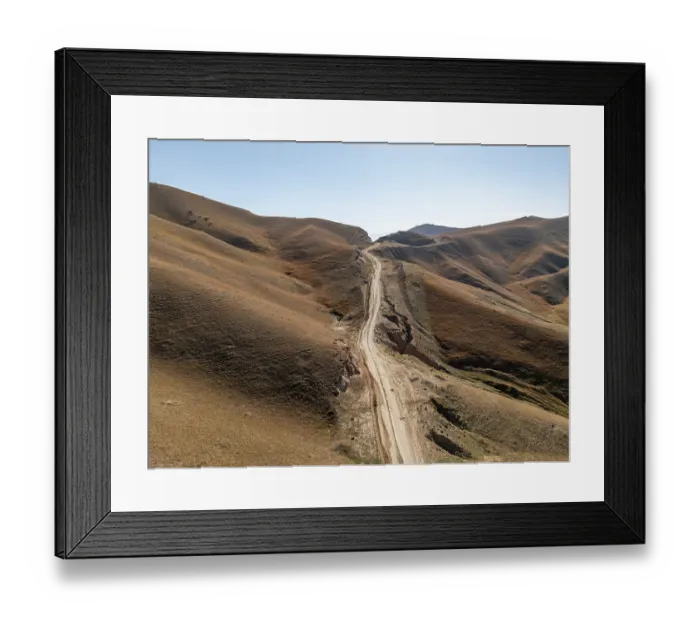 Framed Print : Moldo-Ashuu Pass, rutted road between yellow hills