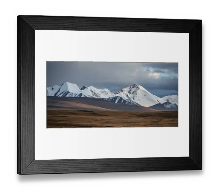 Framed Print : Glaciated and snow-covered mountains