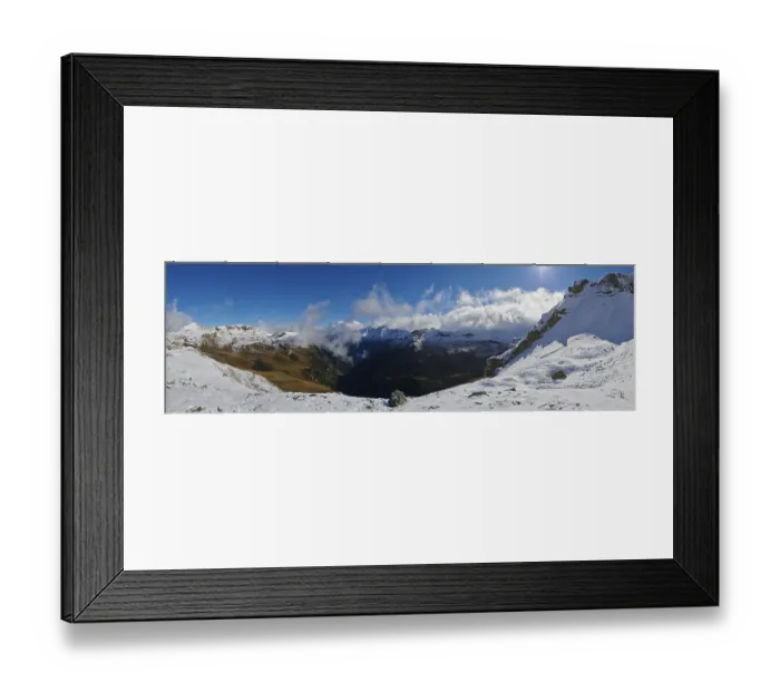Framed Print : Mountains and valleys with clouds on a sunny day at Hochalpenstrasse