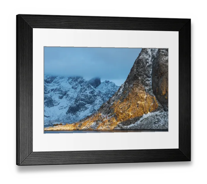 Framed Print : Illuminated rock masiv at sunrise in Scandinavian landscape