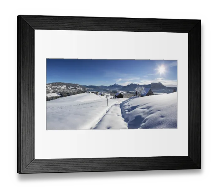 Framed Print : View of snow-covered Mondseeland with Schafberg and Drachenwand Framed Print : View of snow-covered Mondseeland with Schafberg and Drachenwand