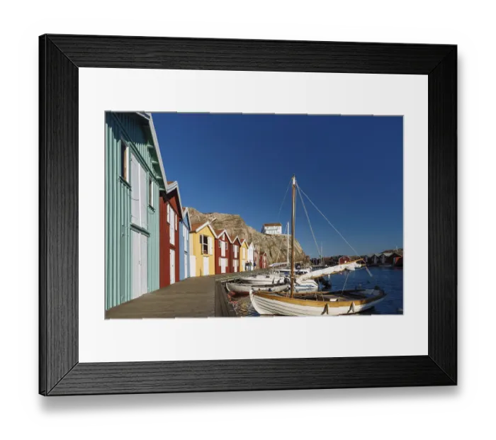 Framed Print : Boats and colourful boathouses in the harbour of Smoegen