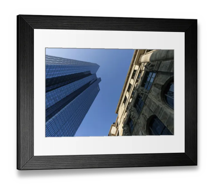 Framed Print : Glass facade of Deutsche Bank, next to it facade of an old house