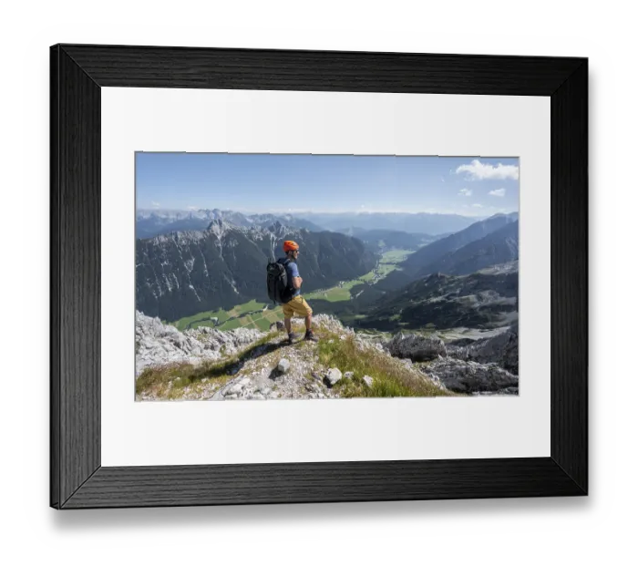 Framed Print : Mountaineer at the summit of the Obere Wettersteinspitze