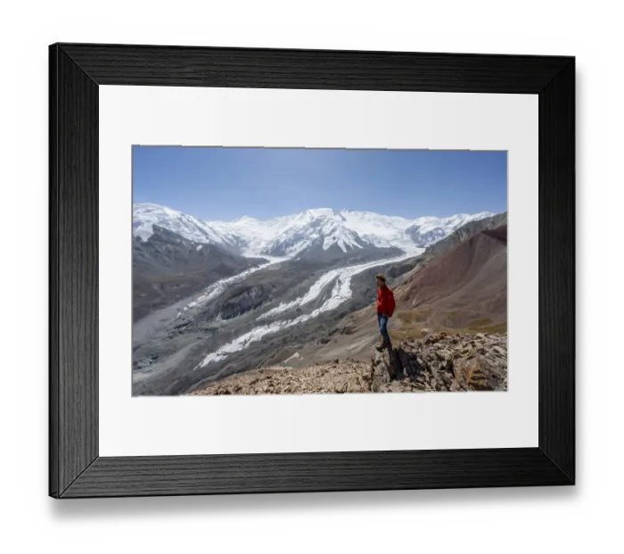Framed Print : Mountaineer at Traveller's Pass with view of impressive mountain landscape Framed Print : Mountaineer at Traveller's Pass with view of impressive mountain landscape