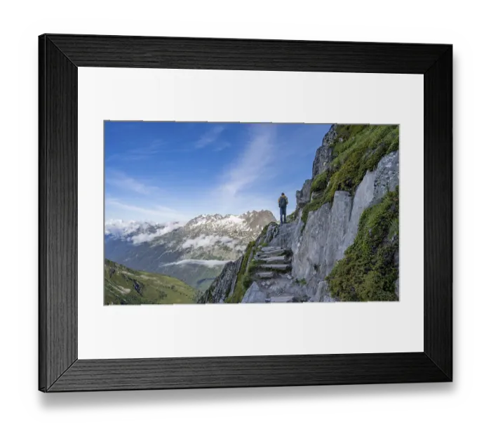 Framed Print : Mountaineer on a hiking trail, view of mountain panorama