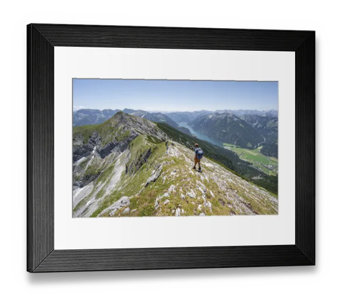 Framed Print : Mountaineer on the summit ridge of the Unnuetz