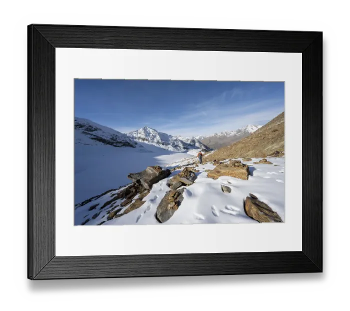 Framed Print : Mountaineer on a hiking trail with snow Framed Print : Mountaineer on a hiking trail with snow