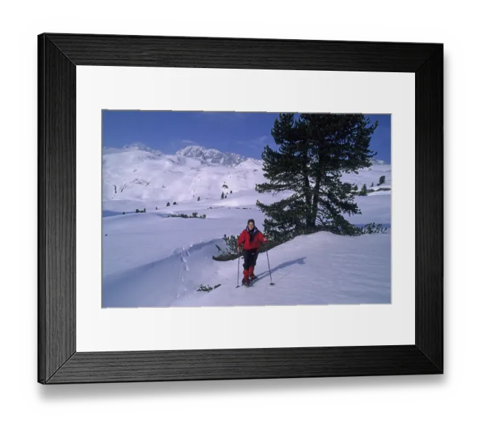 Framed Print : Woman snowshoeing in the Dachstein-area Austria