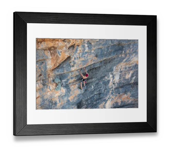 Framed Print : Climber climbing on a rock face Framed Print : Climber climbing on a rock face