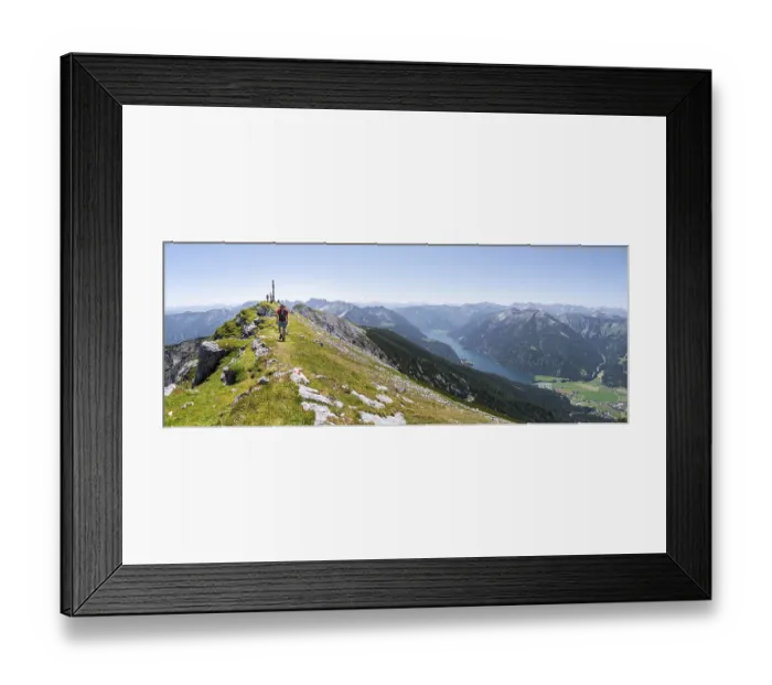 Framed Print : Mountaineer on the summit ridge of the Unnuetz