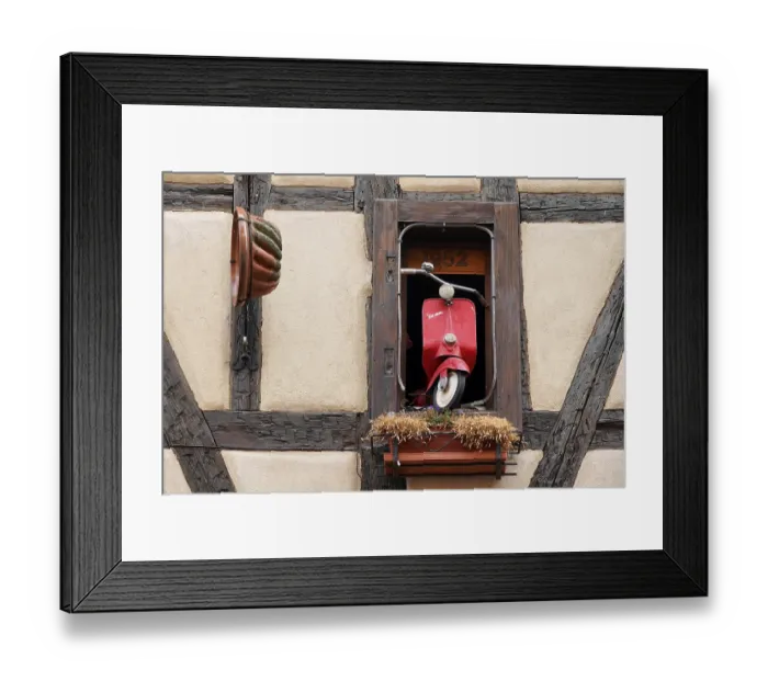 Framed Print : Decorated window on a half-timbered house in the historic old town of Riquewihr Framed Print : Decorated window on a half-timbered house in the historic old town of Riquewihr
