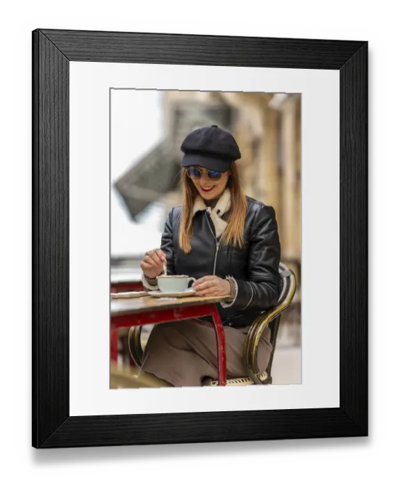 Framed Print : Tourist savoring a cappuccino at an outdoor cafe in bordeaux