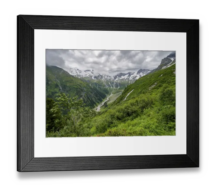 Framed Print : View of Stilluppbach and cloudy mountain peaks in Stillupptal Framed Print : View of Stilluppbach and cloudy mountain peaks in Stillupptal