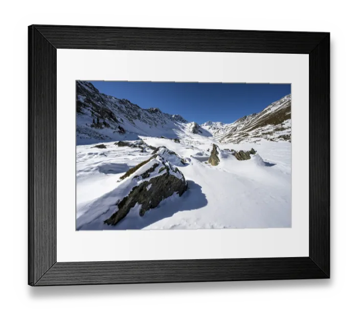 Framed Print : Snow-covered mountain landscape in winter in the Madritsch Valley