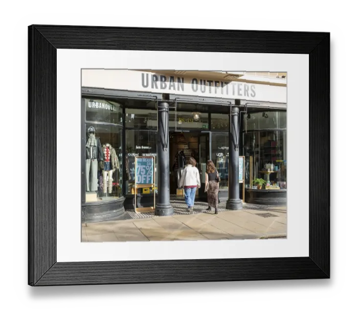 Framed Print : Urban Outfitters clothes shop store in city centre