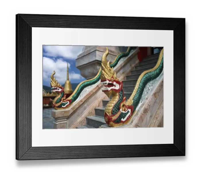 Framed Print : Dragon on staircase of tower with top of Chedi highest building in temple complex buddhist monastery Wat Chalong Wat