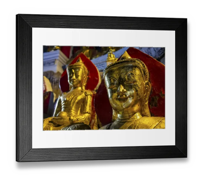 Framed Print : Gilded buddha images in the caves at Pindaya