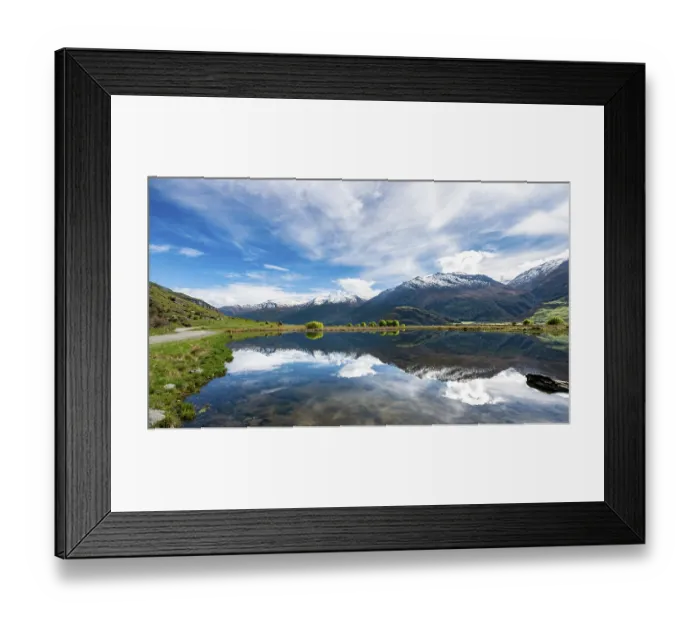 Framed Print : Mountain range reflected in a lake
