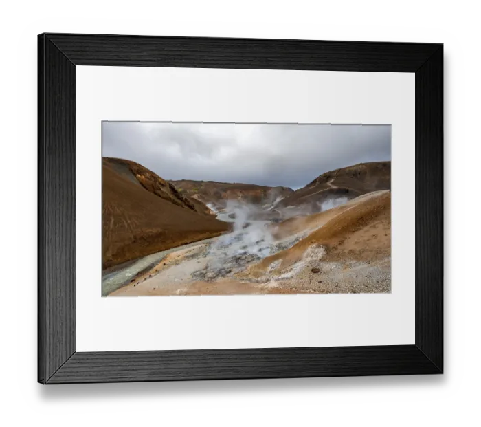 Framed Print : Hot springs and steaming stream between colourful rhyolite mountains Framed Print : Hot springs and steaming stream between colourful rhyolite mountains