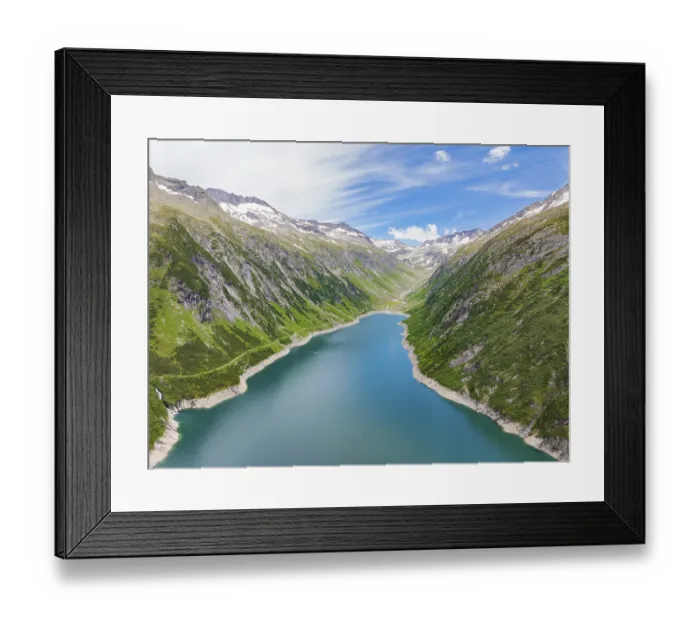 Framed Print : Mountain landscape with a blue lake in the centre