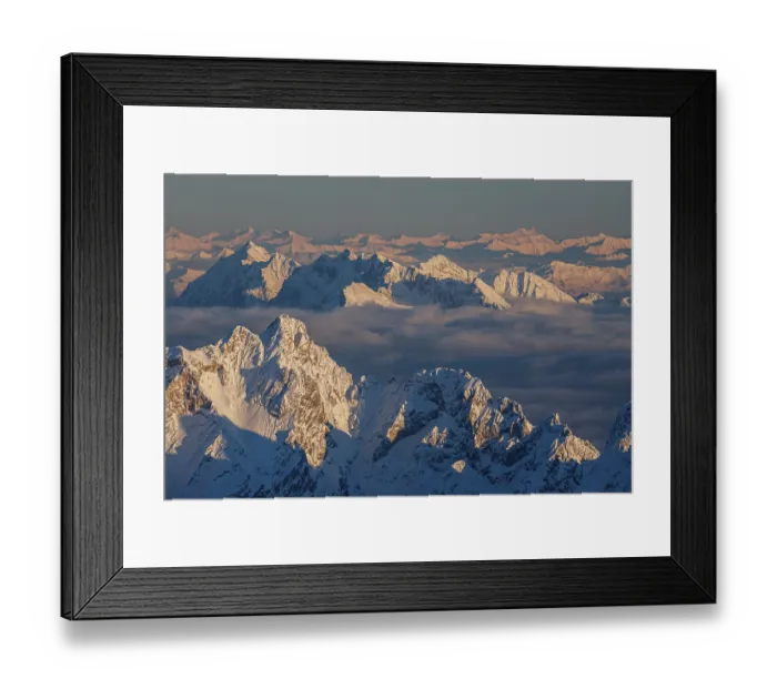 Framed Print : Mountain peak above high fog, evening light