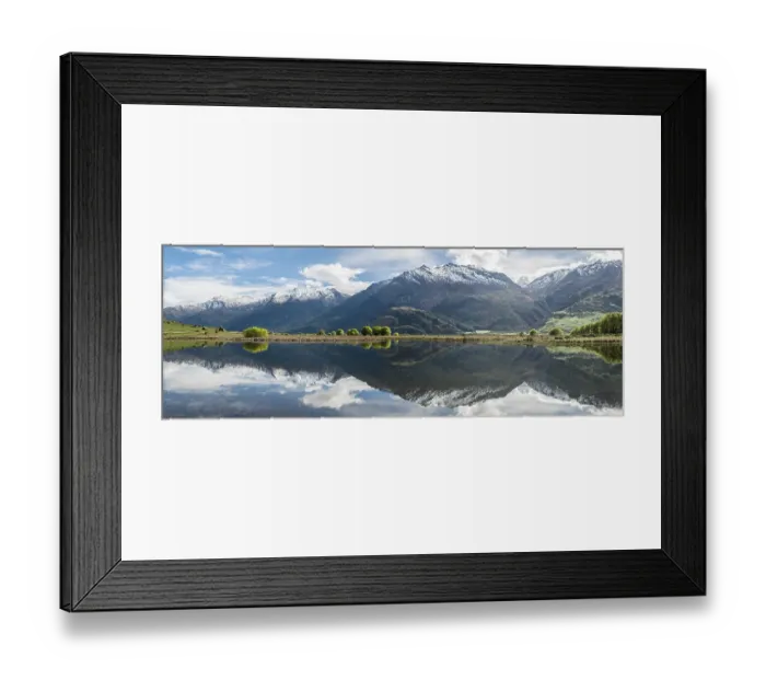 Framed Print : Mountain range reflected in a lake