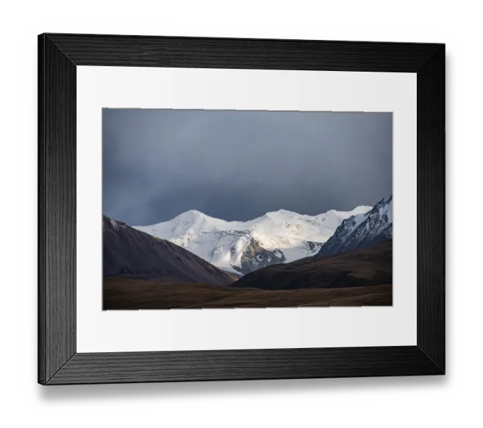 Framed Print : Glaciated and snow-capped mountains