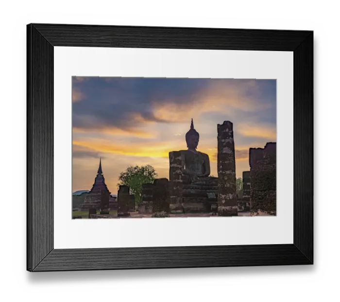 Framed Print : Sunset at a Buddha statue of the temple Wat Mahathat Framed Print : Sunset at a Buddha statue of the temple Wat Mahathat