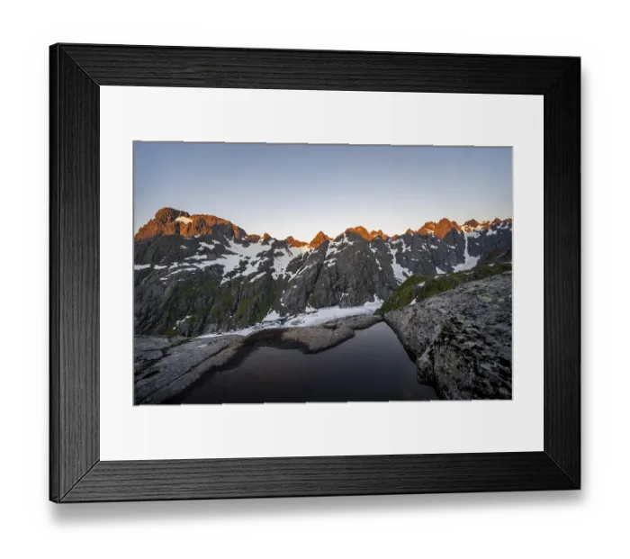 Framed Print : Rocky mountain peaks and Trollfjordvatnet with snow Framed Print : Rocky mountain peaks and Trollfjordvatnet with snow